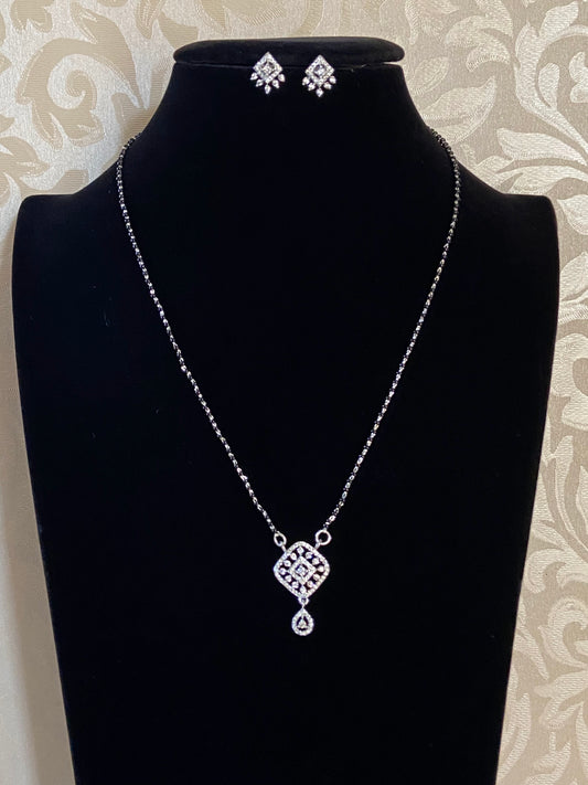 Diamond look pendant black beads necklace