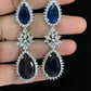 AD Rhodium Earrings | Blue Sapphire Drops Earrings