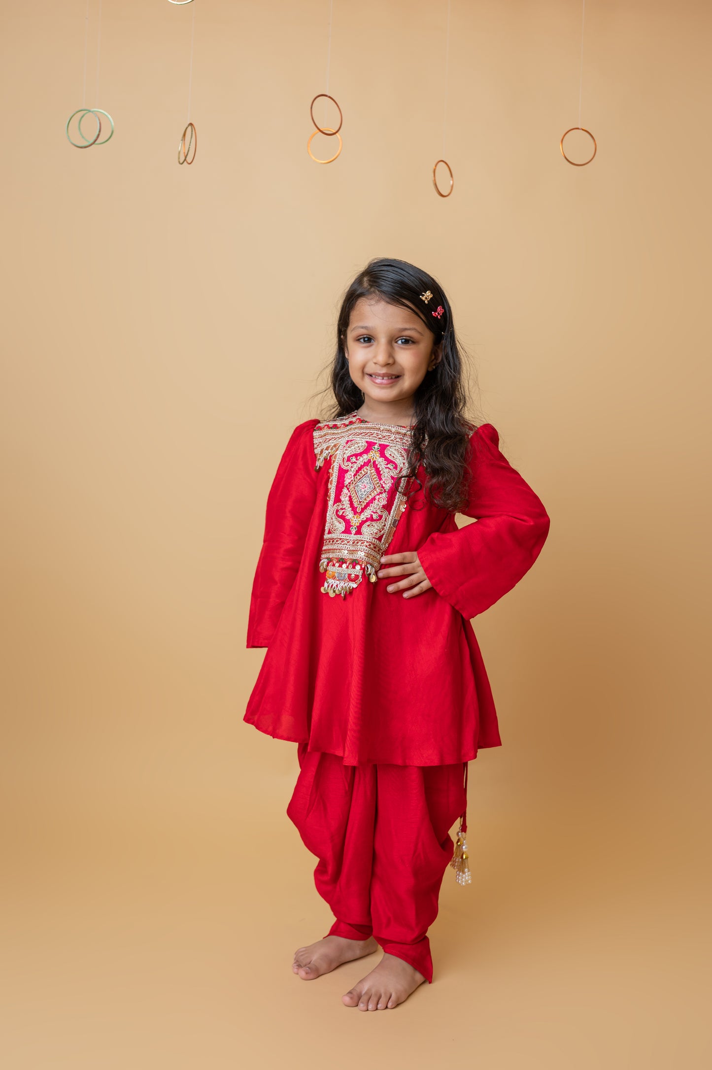 Girls Embroidered Yoke Tassels Enhanced Red Kurti And Dhoti