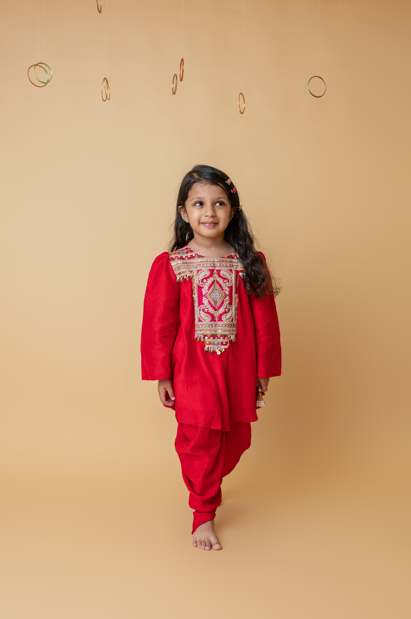 Girls Embroidered Yoke Tassels Enhanced Red Kurti And Dhoti